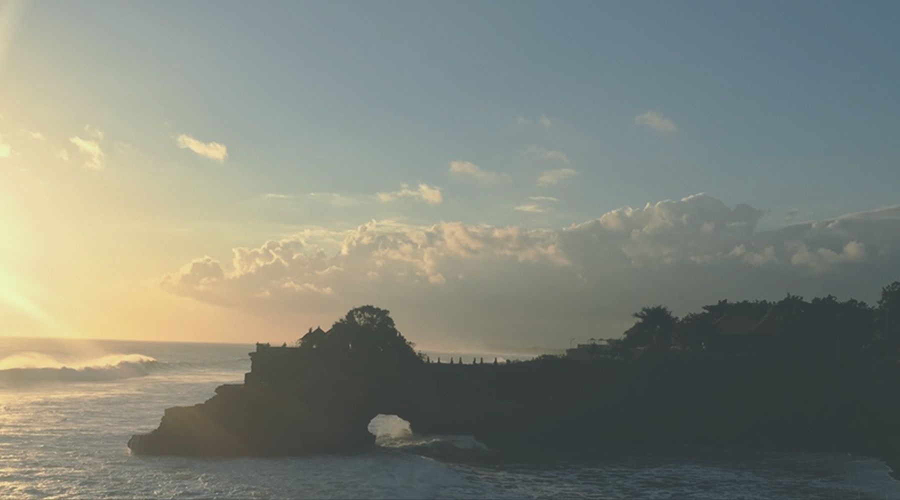 Bali sunset,” “ocean waves,” “coastal cliffs,” “relaxation,” and “natural beauty