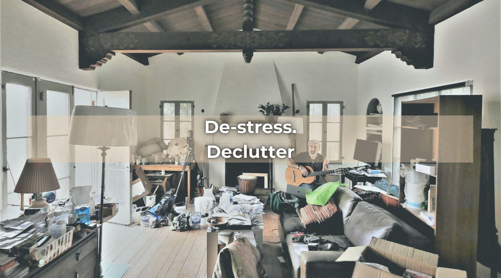 Cluttered room with text overlay “De-stress. Declutter” for a calming and organizing message.