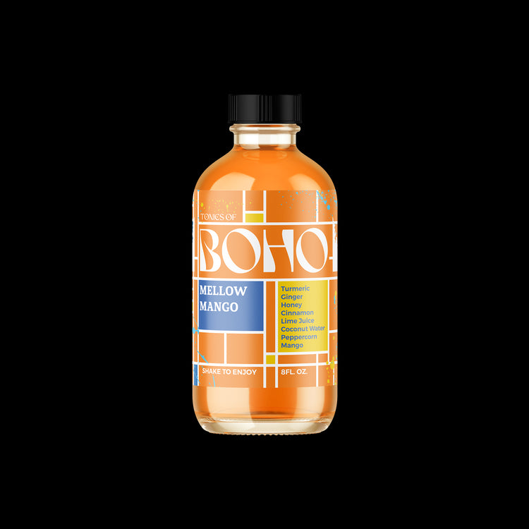 Tonics of Boho Mellow Mango Jamu with Mondrian-style label, featuring mango, turmeric, and ginger blend.