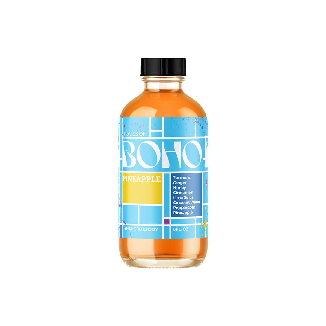 Tonics of Boho Pineapple Jamu with Mondrian-inspired label, featuring turmeric, ginger, and pineapple blend.